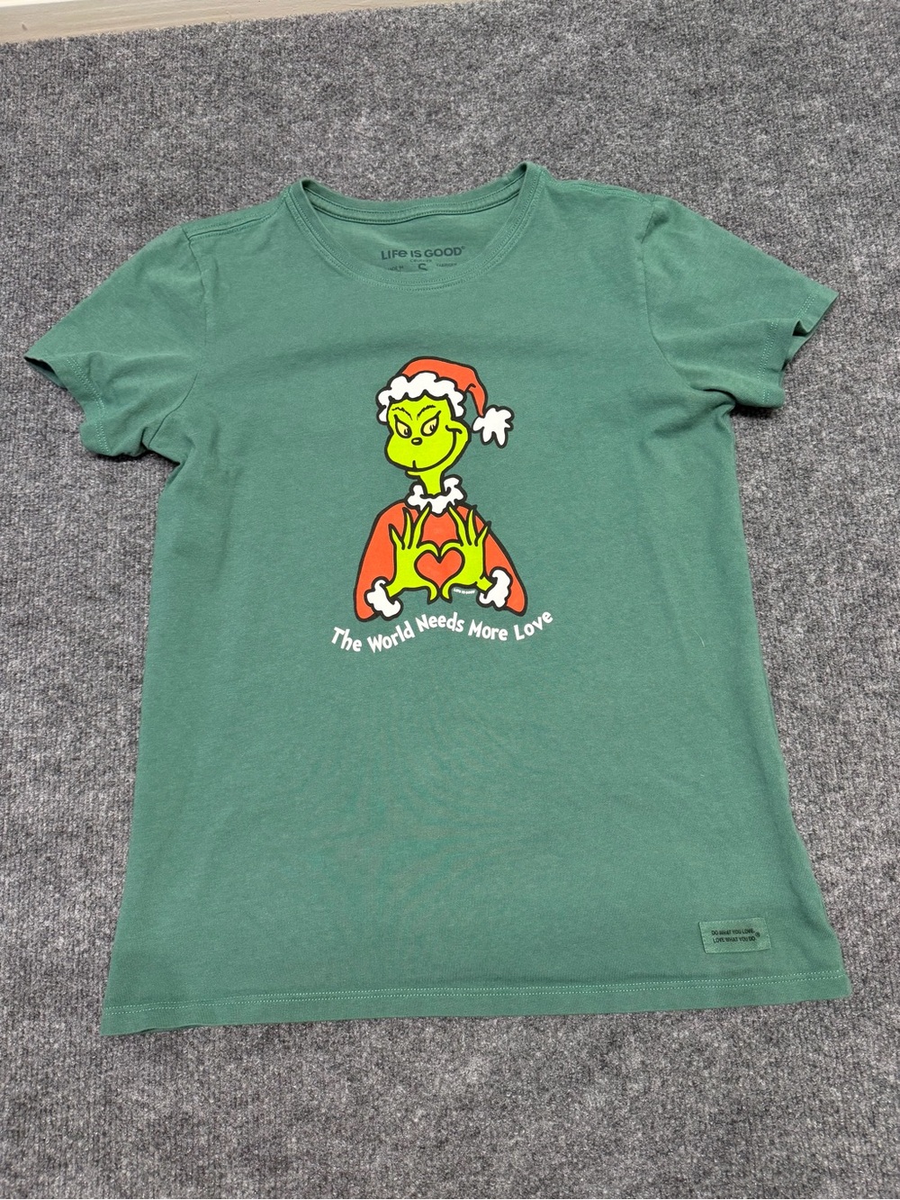 Life Is Good green tee with Grinch heart graphic